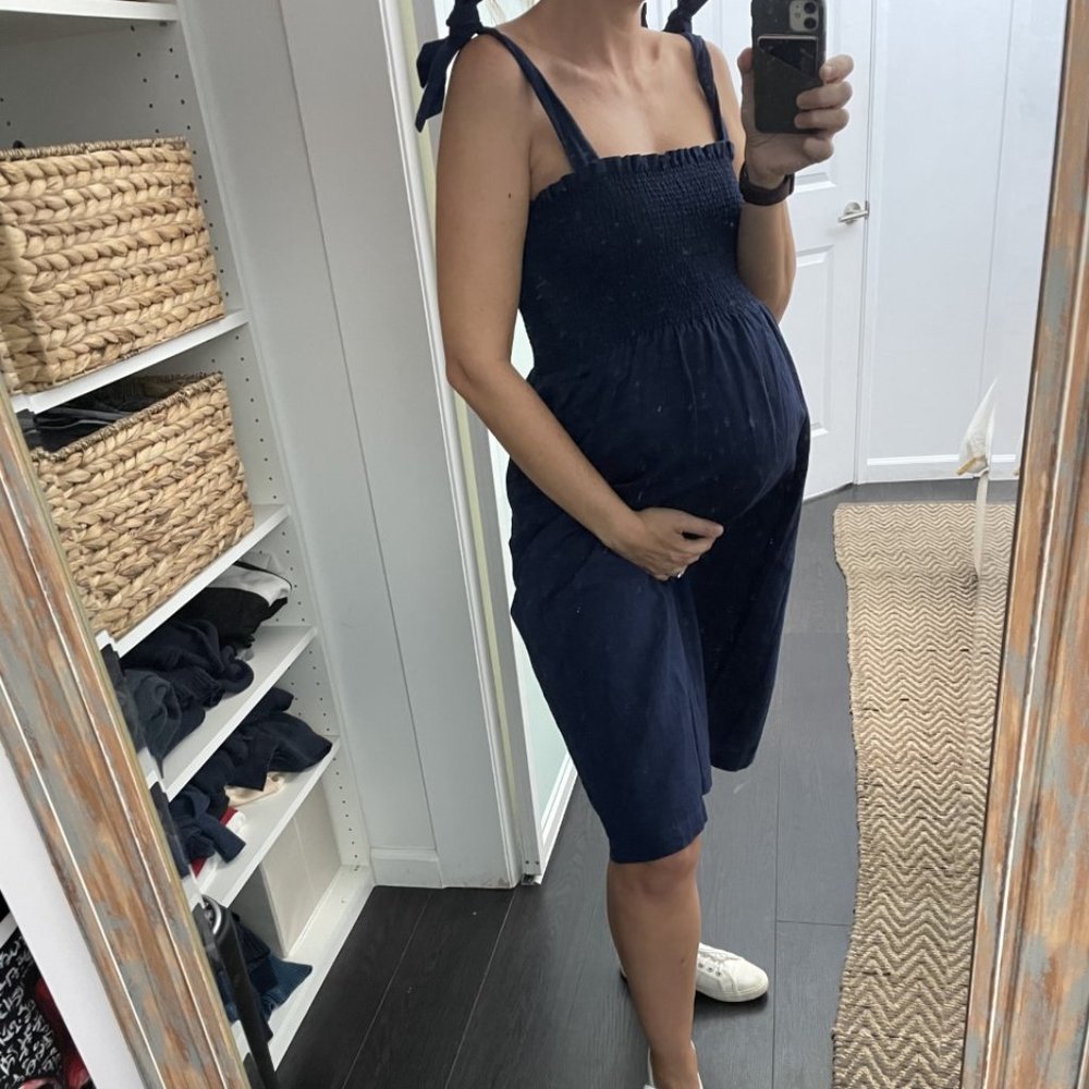 Lulu's bump-friendly navy blue looking up smocked tie-strap dress